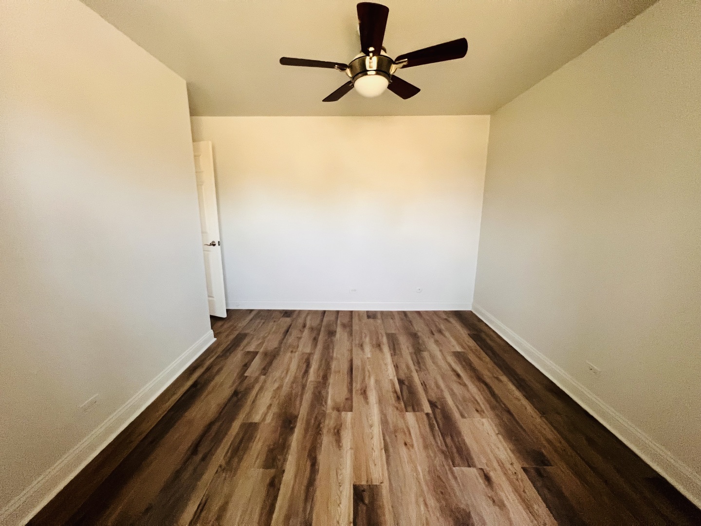 575 Greystone Lane, Unit A2 Wheeling, IL 60090 - Photo 12 of 13 a view of a room with wooden floor