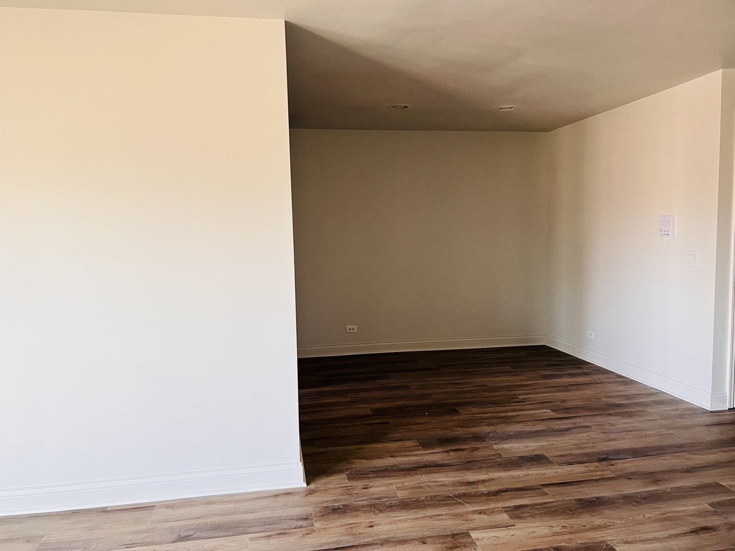 575 Greystone Lane, Unit A2 Wheeling, IL 60090 - Photo 7 of 13 a view of an empty room with wooden floor