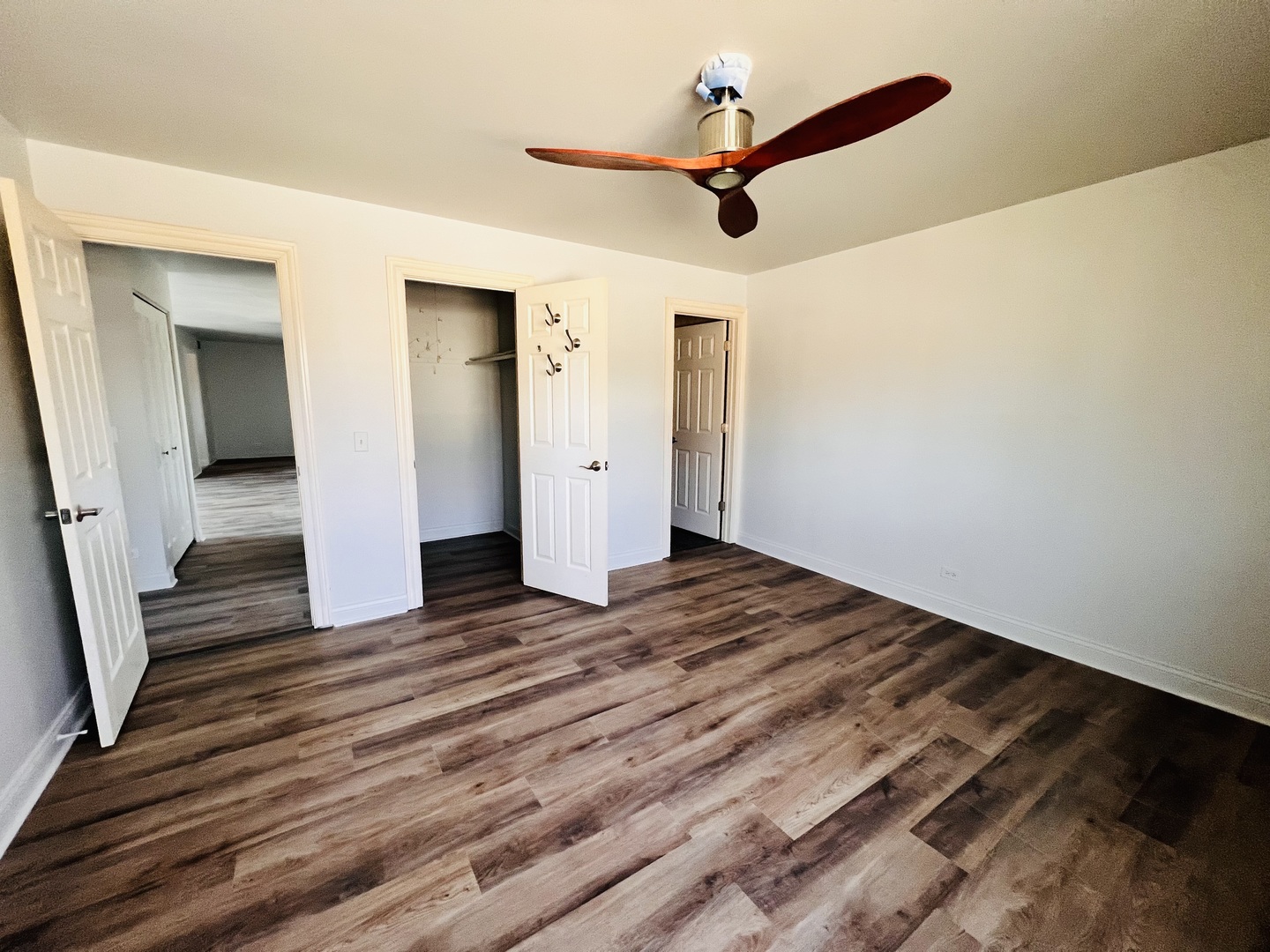 575 Greystone Lane, Unit A2 Wheeling, IL 60090 - Photo 9 of 13 wooden floor in an empty room