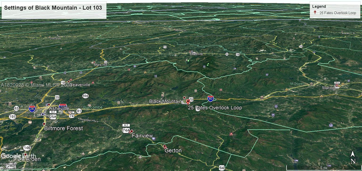 25 Fates Overlook Loop, Unit 103 Black Mountain, NC 28711 - Photo 21 of 21 a backyard of a house with lots of green space and trees all around
