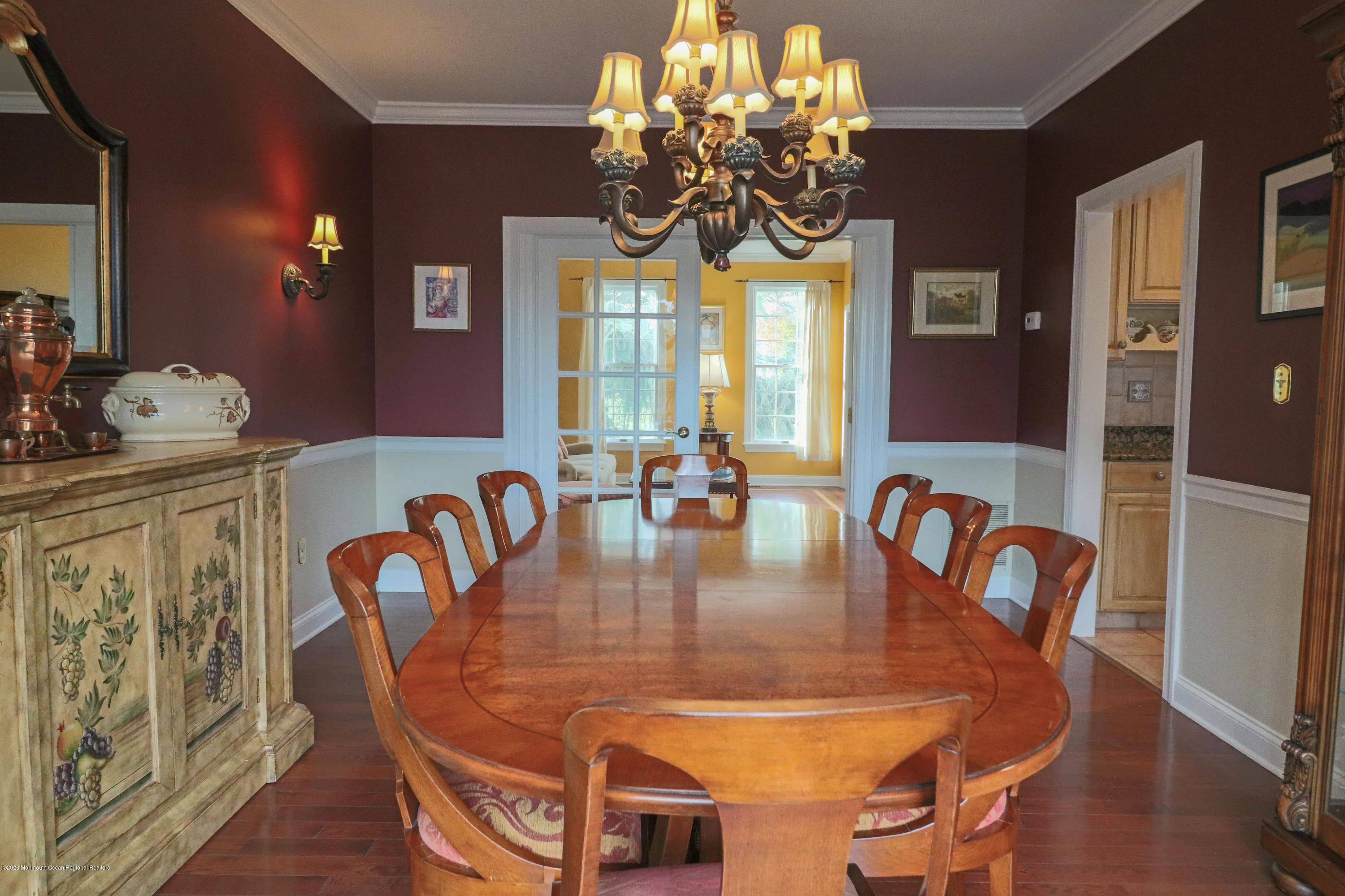31 Rustic Way Freehold, NJ 07728 - Photo 16 of 62 a dining room with furniture potted plants and wooden floor