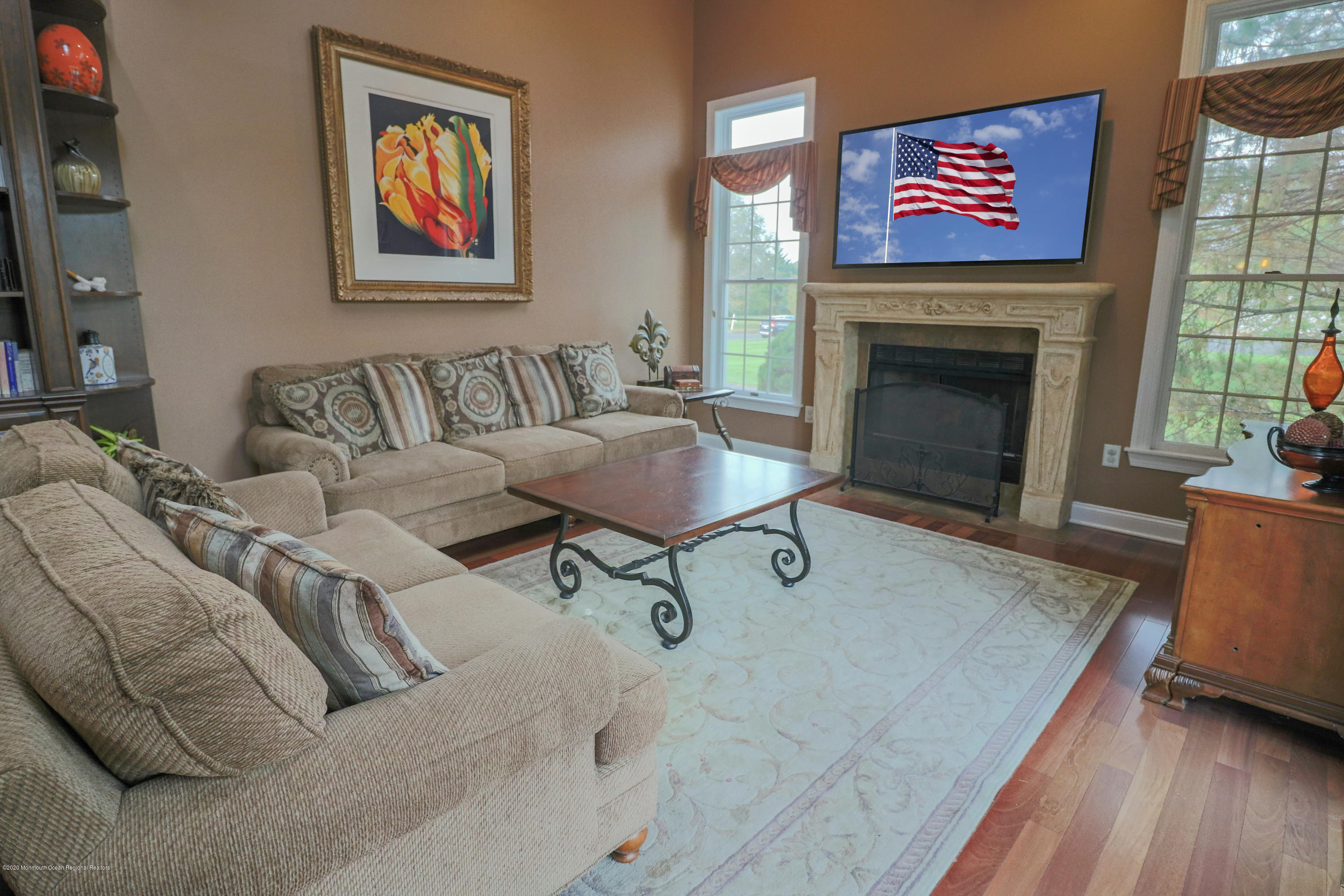 31 Rustic Way Freehold, NJ 07728 - Photo 26 of 62 a living room with furniture and a fireplace