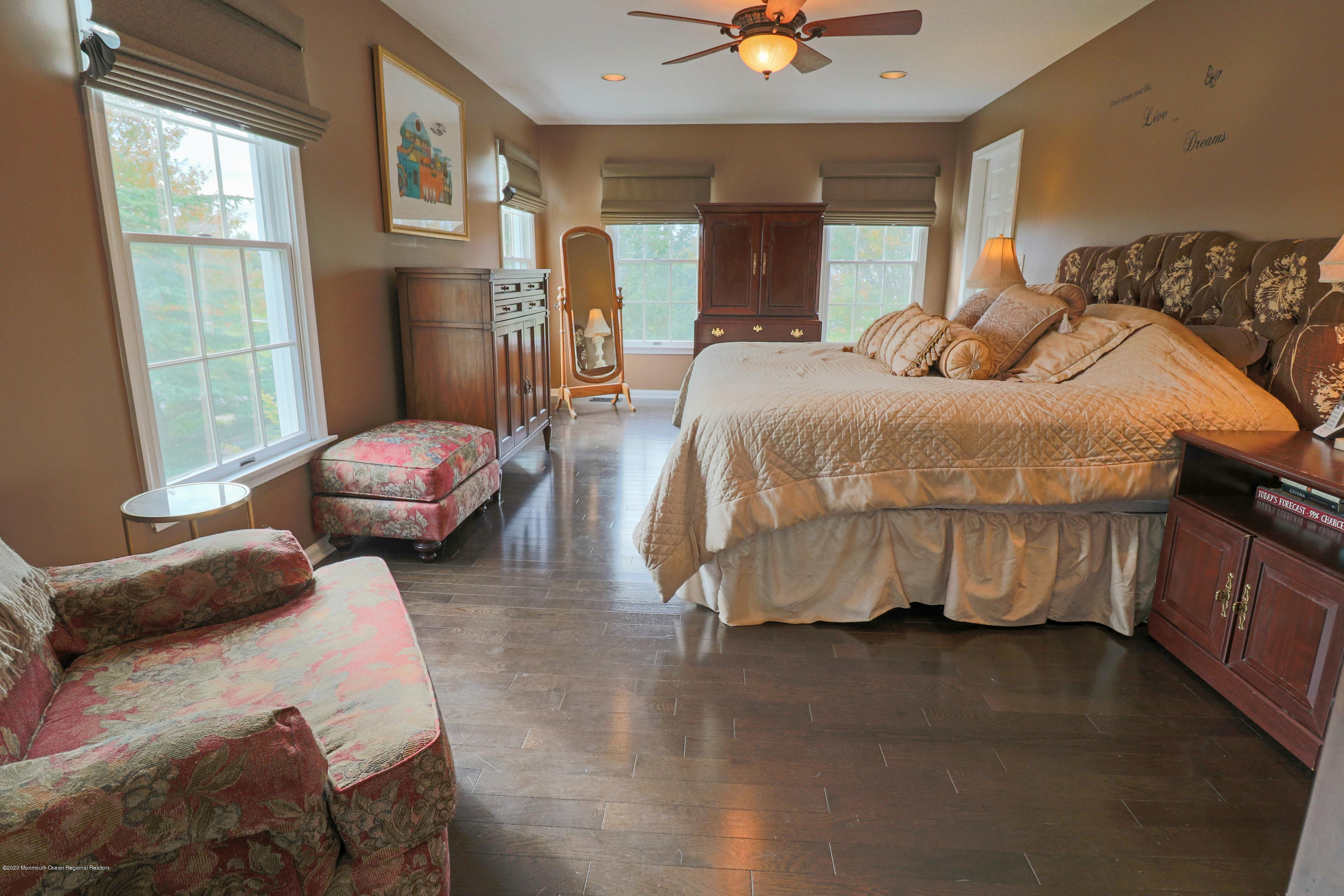 31 Rustic Way Freehold, NJ 07728 - Photo 38 of 62 a bedroom with a bed and a chandelier