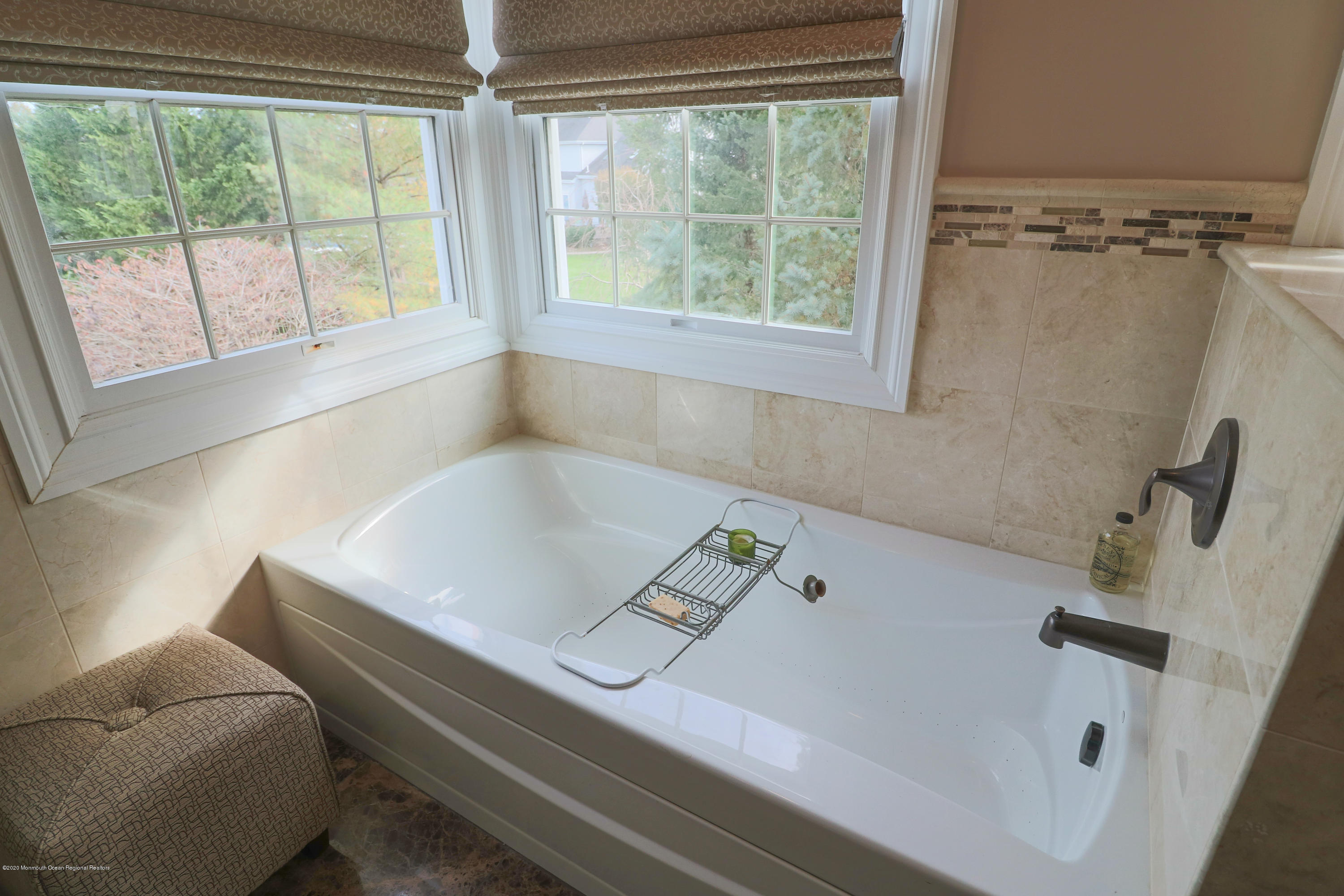 31 Rustic Way Freehold, NJ 07728 - Photo 42 of 62 a bath tub sitting in a bathroom next to a window