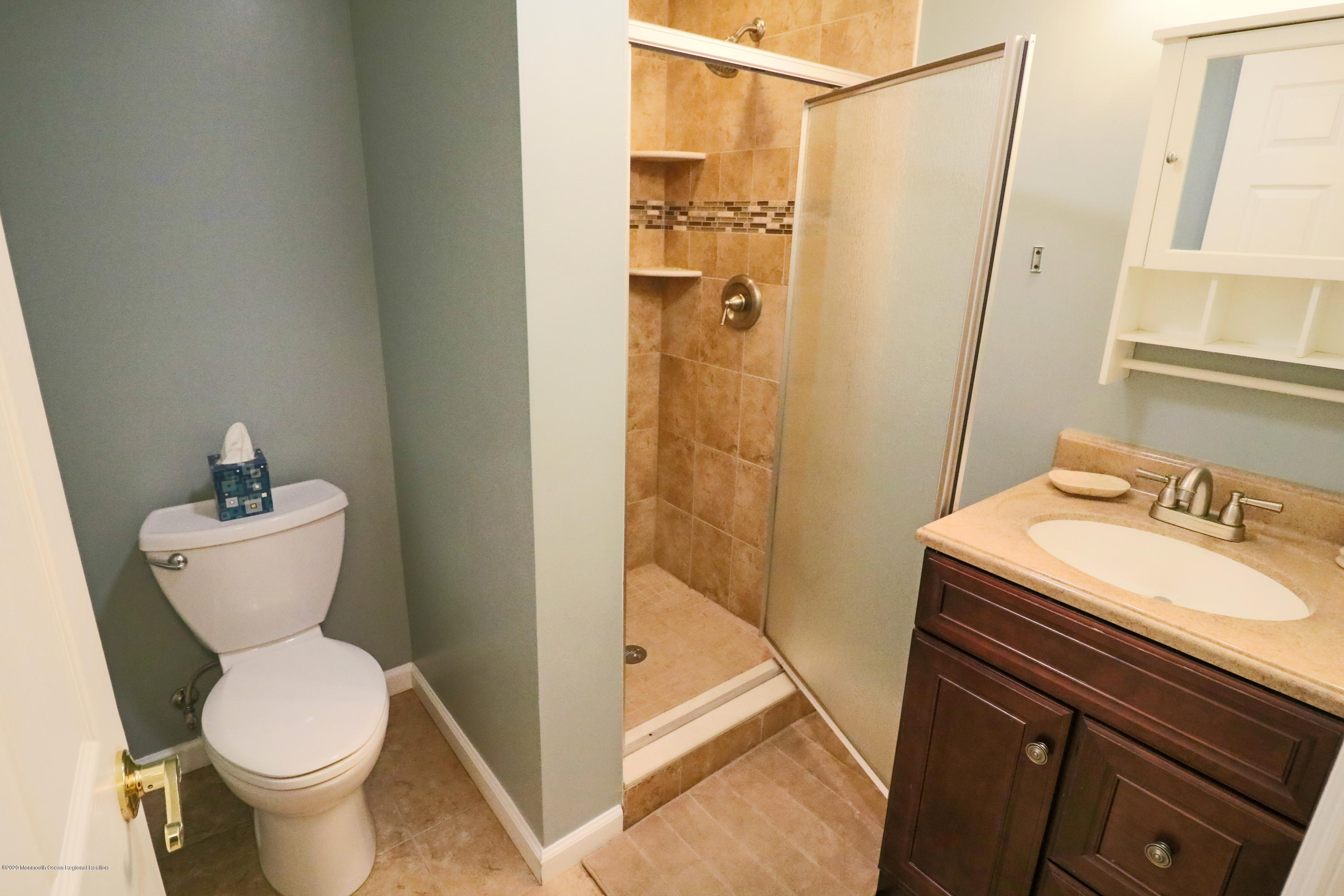 31 Rustic Way Freehold, NJ 07728 - Photo 47 of 62 a bathroom with a sink toilet and shower