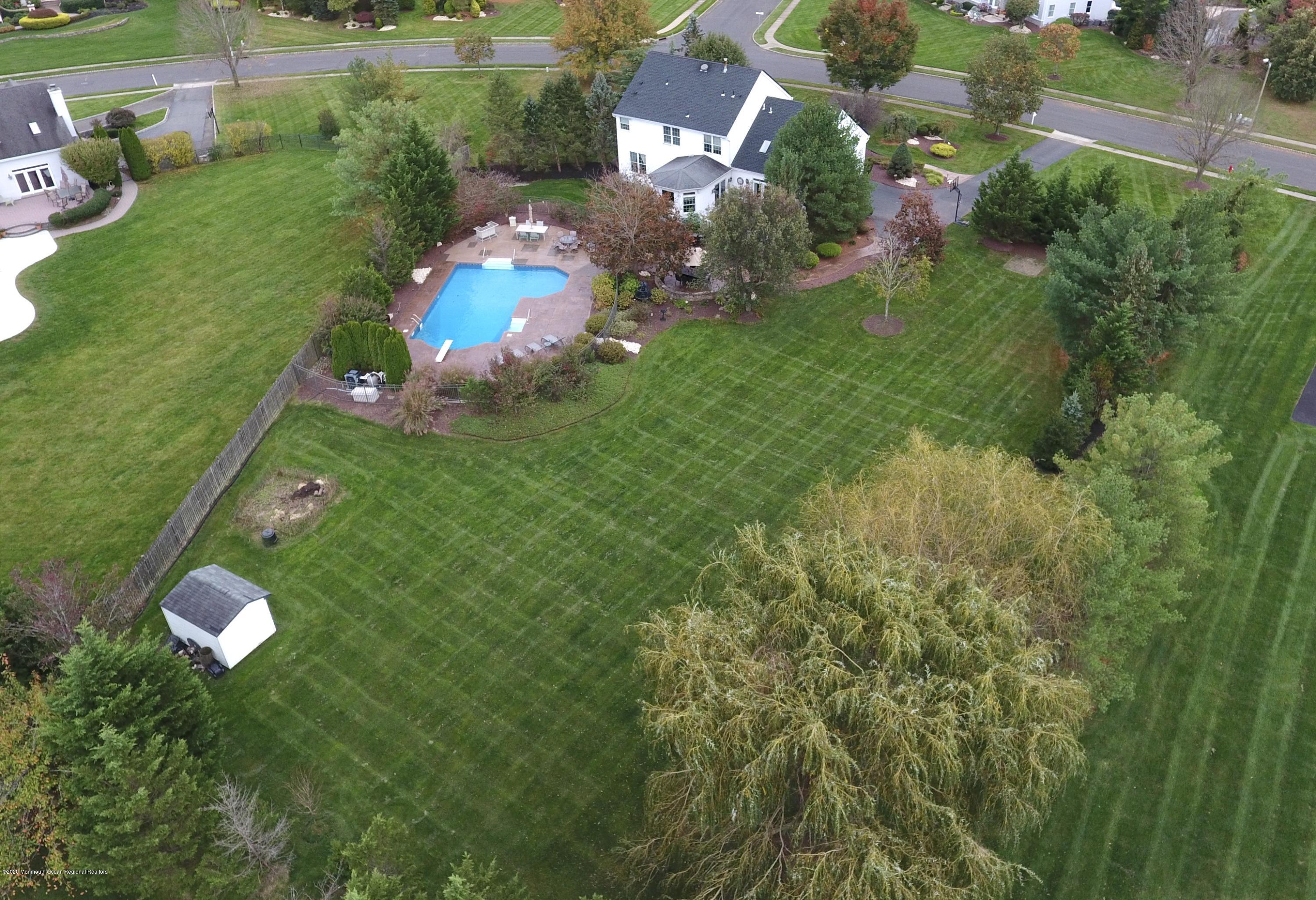 31 Rustic Way Freehold, NJ 07728 - Photo 6 of 62 a view of a house with a backyard