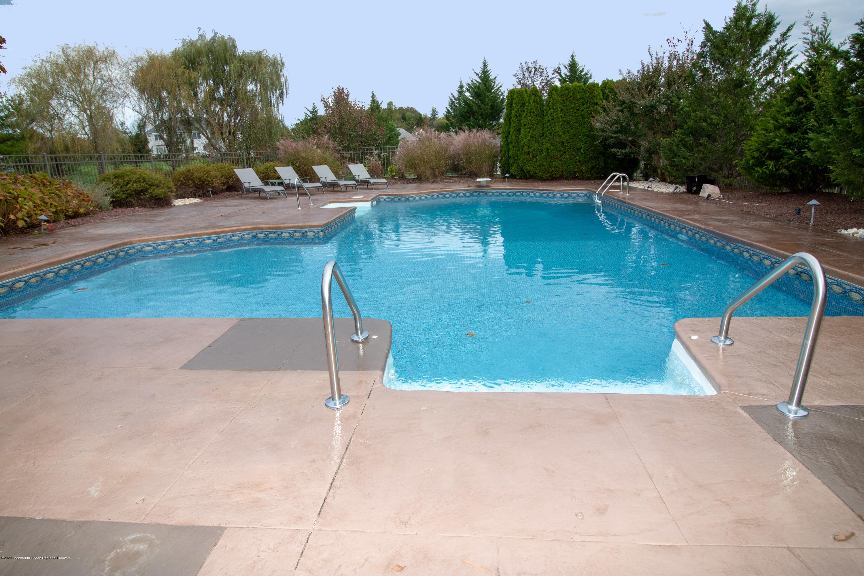 31 Rustic Way Freehold, NJ 07728 - Photo 53 of 62 a view of a swimming pool with a yard