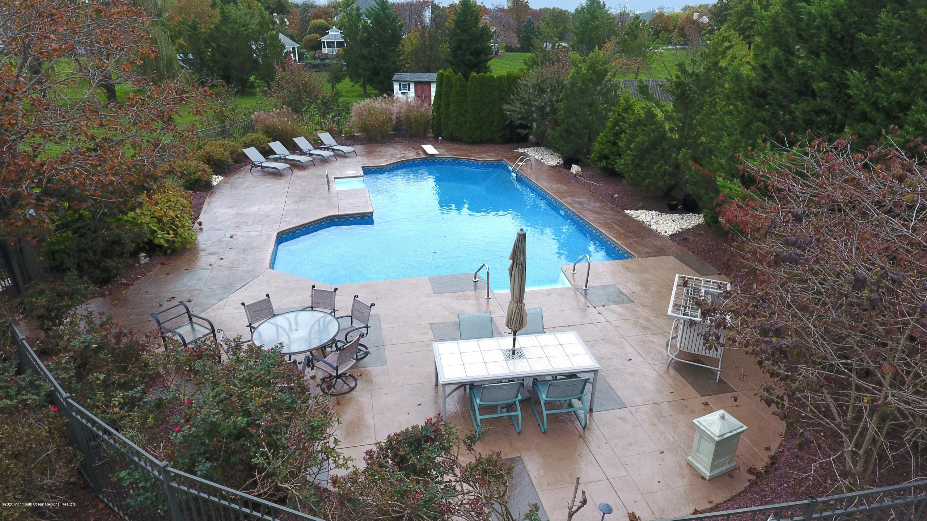 31 Rustic Way Freehold, NJ 07728 - Photo 57 of 62 an aerial view of a house with outdoor seating