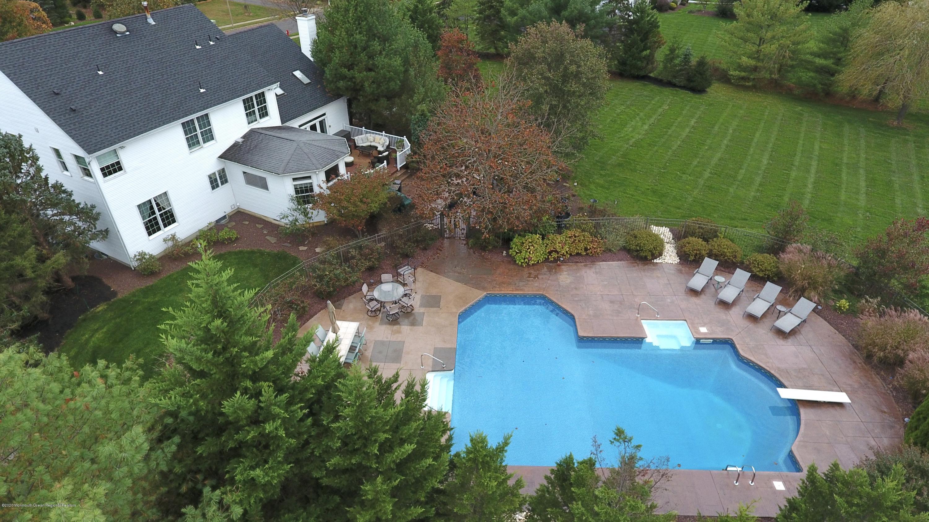 31 Rustic Way Freehold, NJ 07728 - Photo 58 of 62 an aerial view of a house with a yard