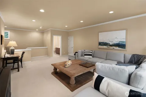 a living room with furniture and a table