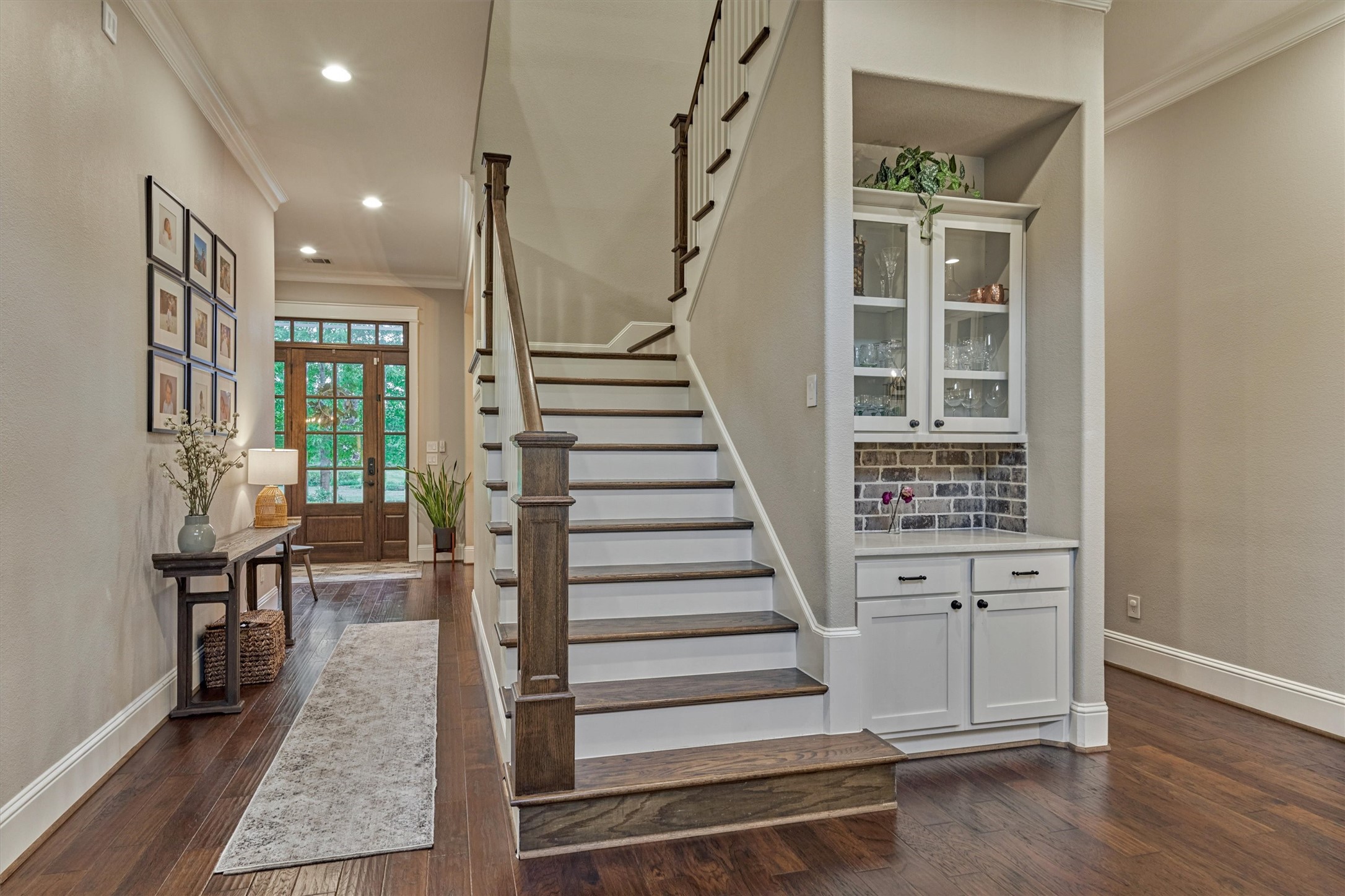 2227 Blue Duck Lane Conroe, TX 77384 - Photo 15 of 50 a view of entryway with wooden floor and stairs