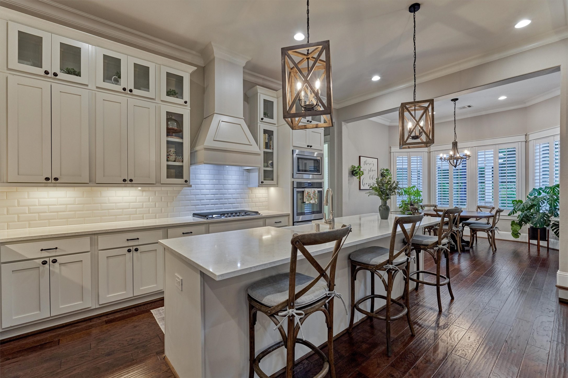 2227 Blue Duck Lane Conroe, TX 77384 - Photo 16 of 50 a kitchen with cabinets and wooden floor