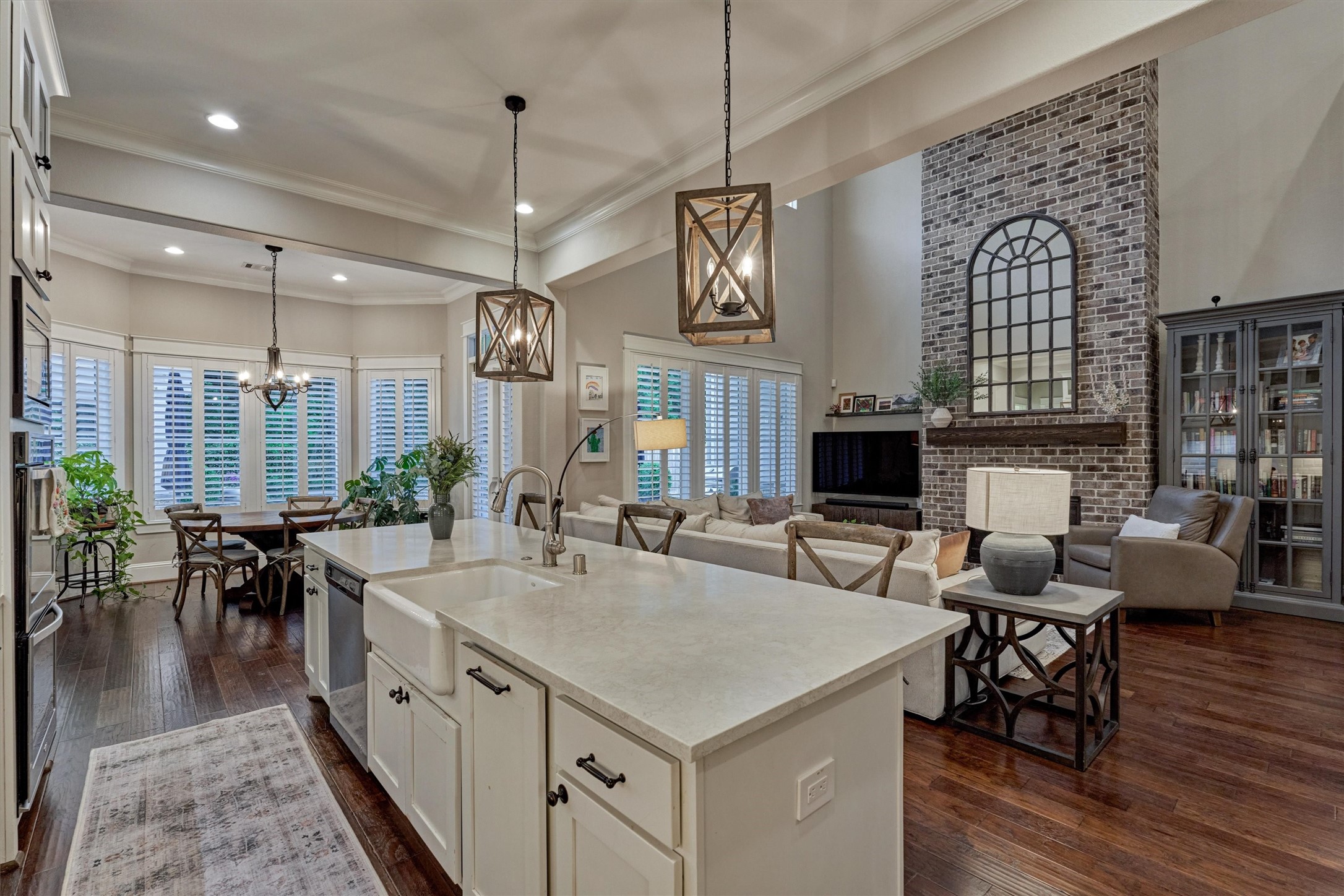 2227 Blue Duck Lane Conroe, TX 77384 - Photo 19 of 50 a kitchen with center island table and chairs