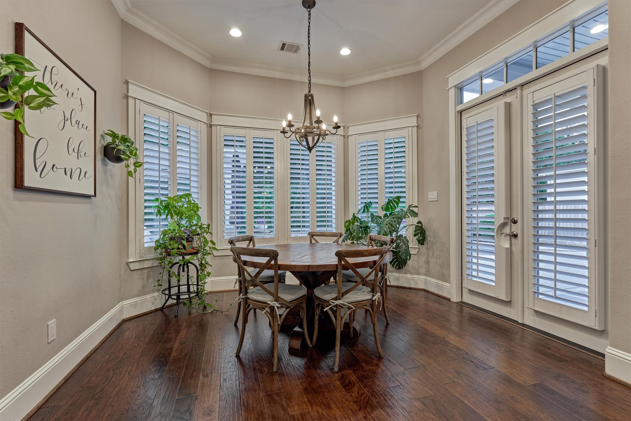 2227 Blue Duck Lane Conroe, TX 77384 - Photo 20 of 50 a view of a dining room with furniture window and wooden floor