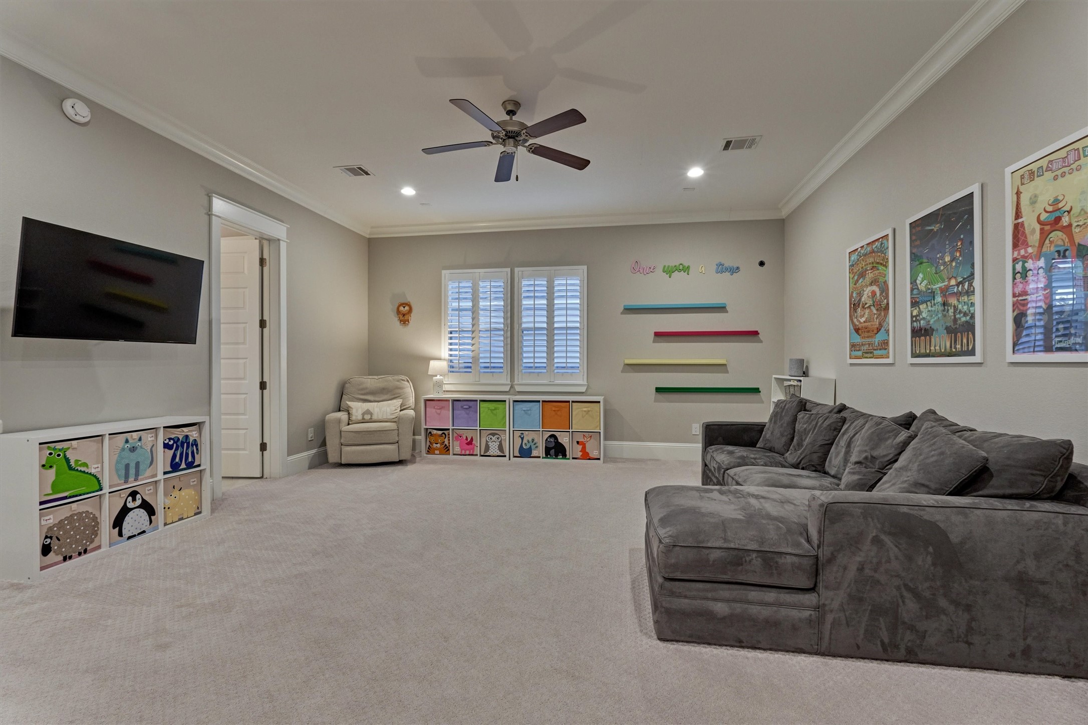 2227 Blue Duck Lane Conroe, TX 77384 - Photo 27 of 50 a living room with furniture and a flat screen tv