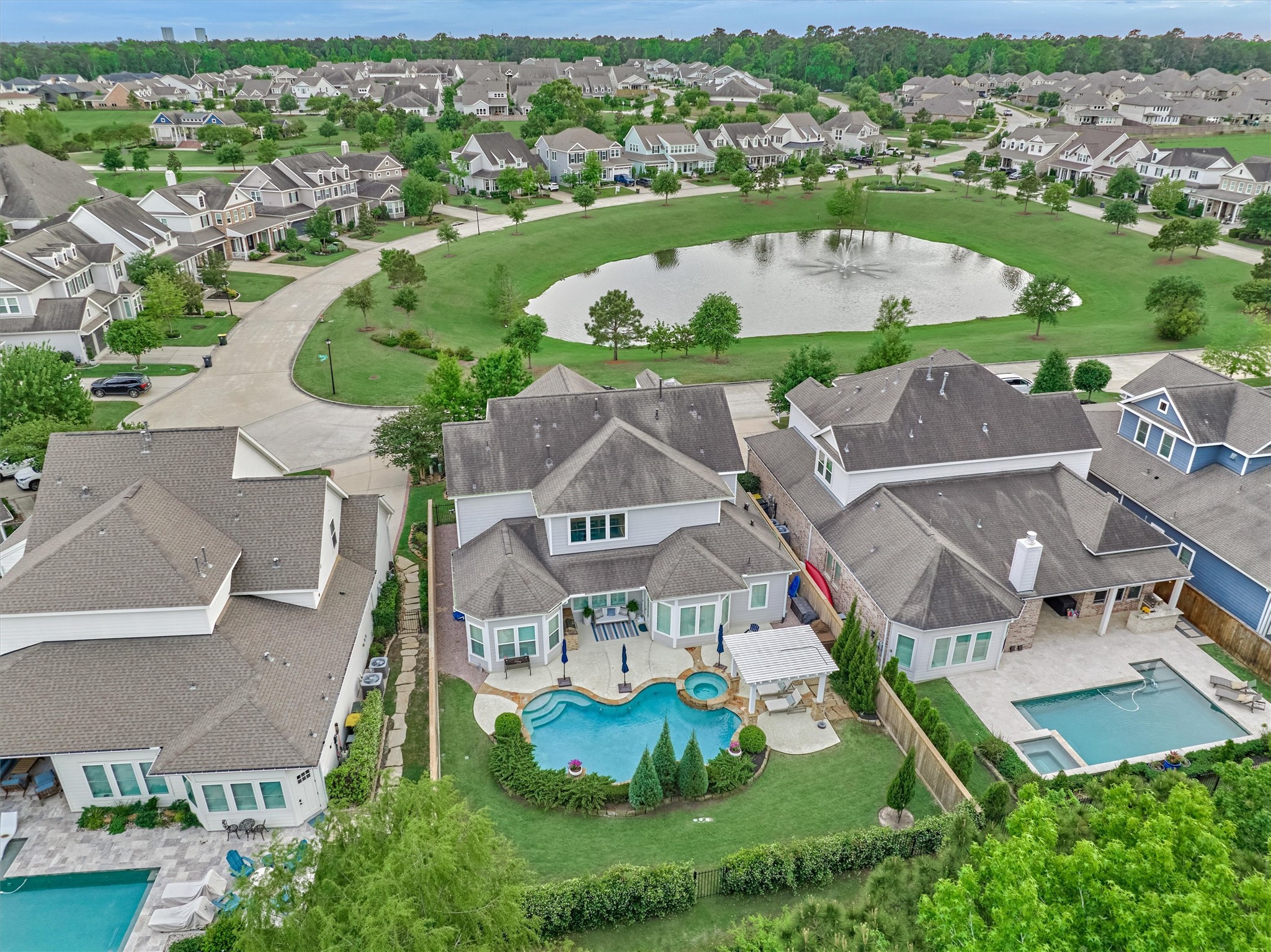 2227 Blue Duck Lane Conroe, TX 77384 - Photo 3 of 50 an aerial view of residential houses with outdoor space and river