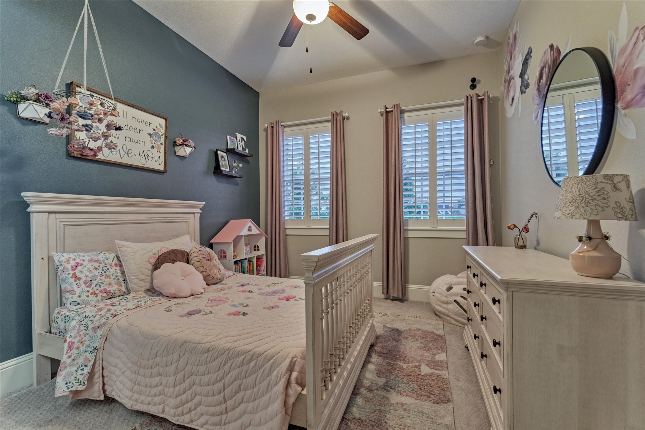2227 Blue Duck Lane Conroe, TX 77384 - Photo 34 of 50 a bedroom with a large bed and a window