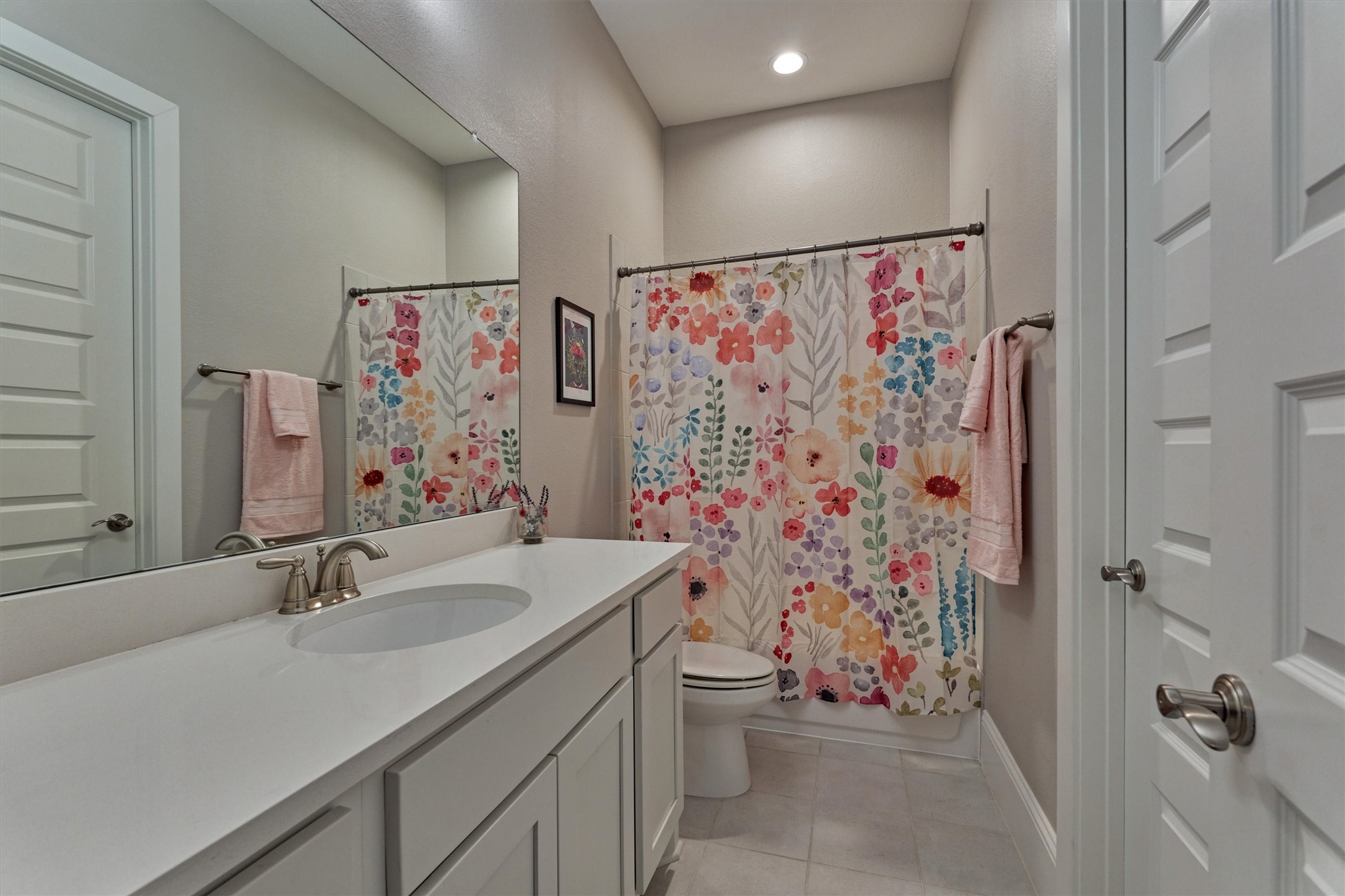 2227 Blue Duck Lane Conroe, TX 77384 - Photo 35 of 50 a bathroom with a sink toilet and shower