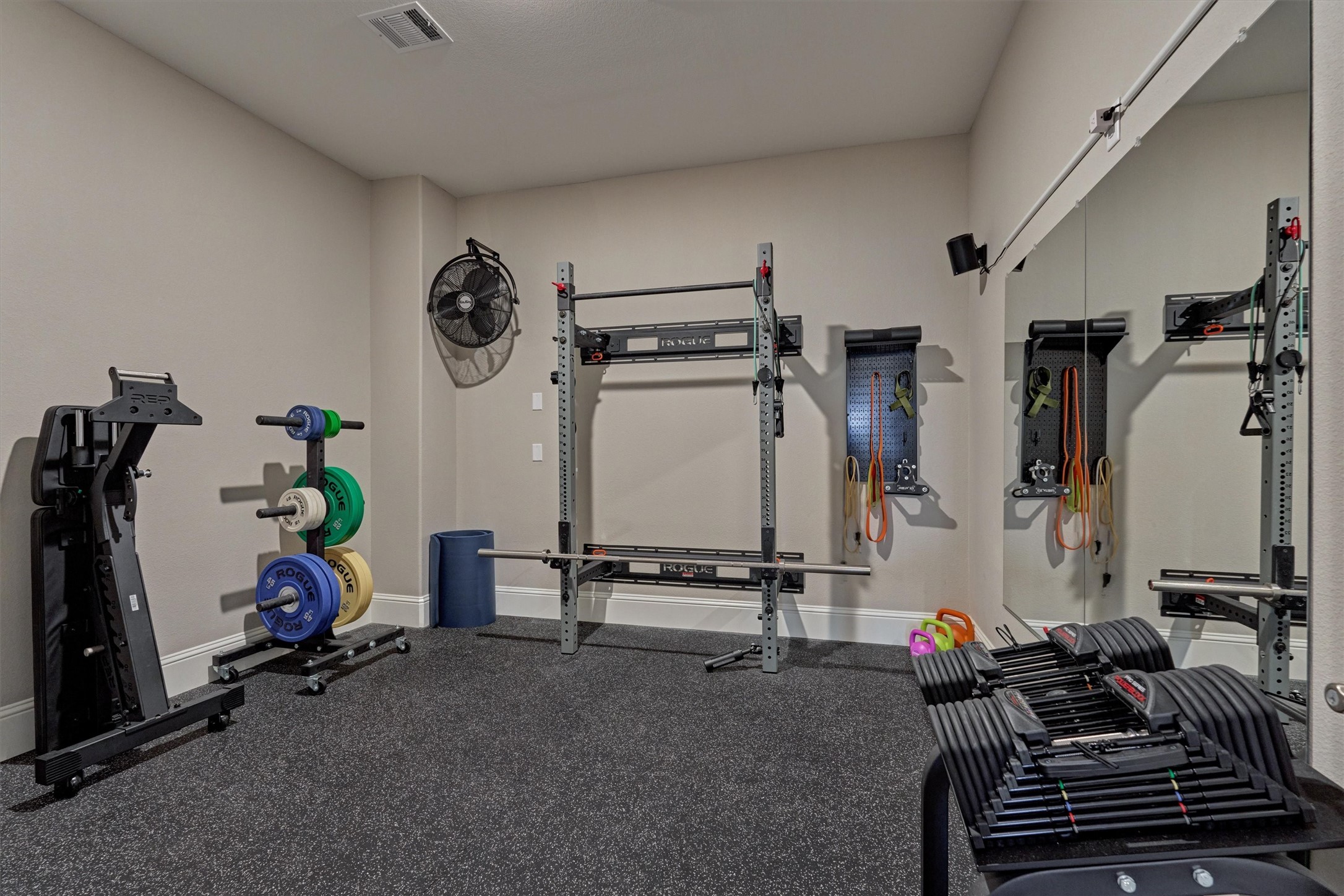 2227 Blue Duck Lane Conroe, TX 77384 - Photo 36 of 50 a room with gym equipment and view of living room