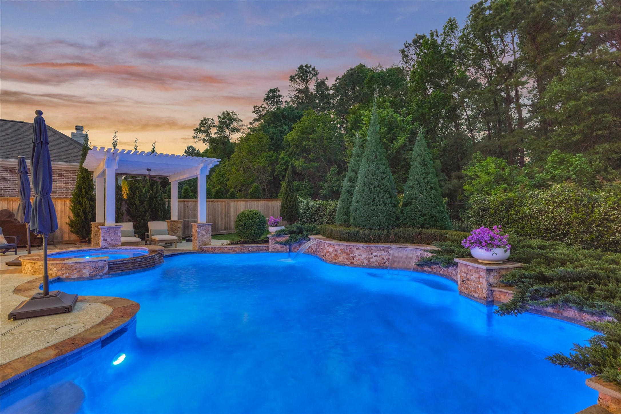2227 Blue Duck Lane Conroe, TX 77384 - Photo 43 of 50 a view of a house with swimming pool and sitting area