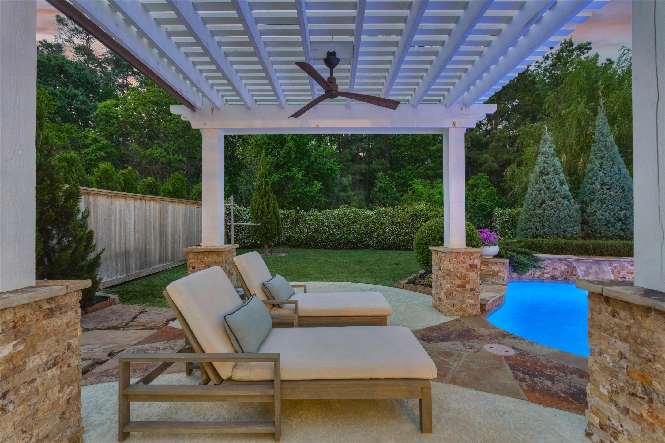 2227 Blue Duck Lane Conroe, TX 77384 - Photo 45 of 50 a view of a patio with a table chairs and a backyard