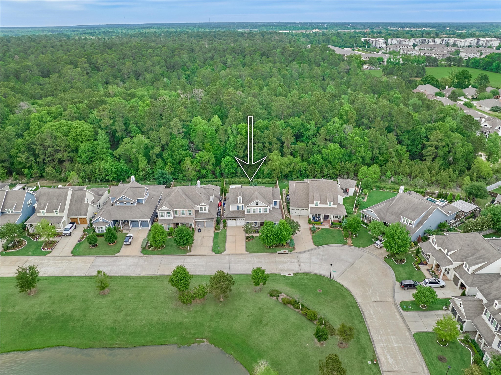 2227 Blue Duck Lane Conroe, TX 77384 - Photo 49 of 50 an aerial view of residential houses with outdoor space and trees