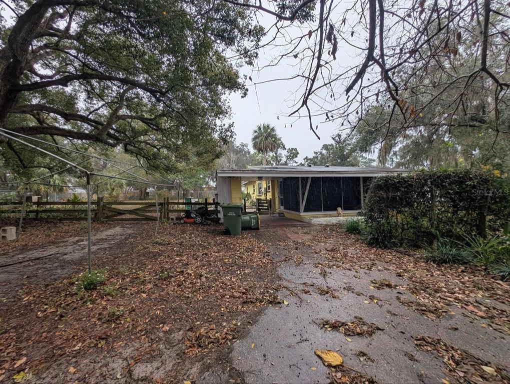 2304 Vine Street Leesburg, FL 34748 - Photo 21 of 25 a front view of a house with garden