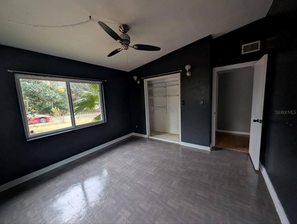 2304 Vine Street Leesburg, FL 34748 - Photo 8 of 25 a view of an empty room with a window