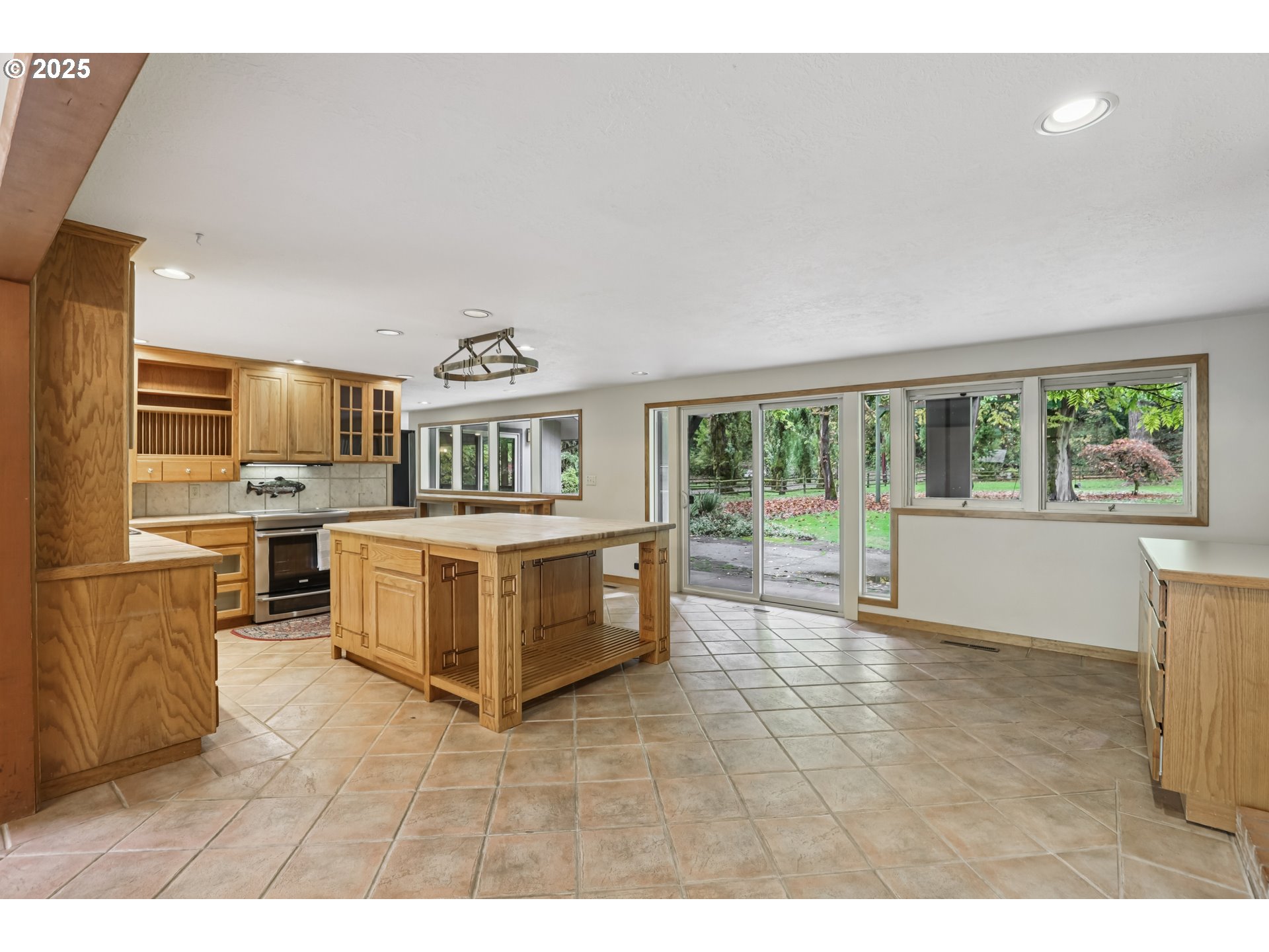 39777 Northwest Murtaugh Road North Plains, OR 97133 - Photo 13 of 45 a living room with furniture and a large window