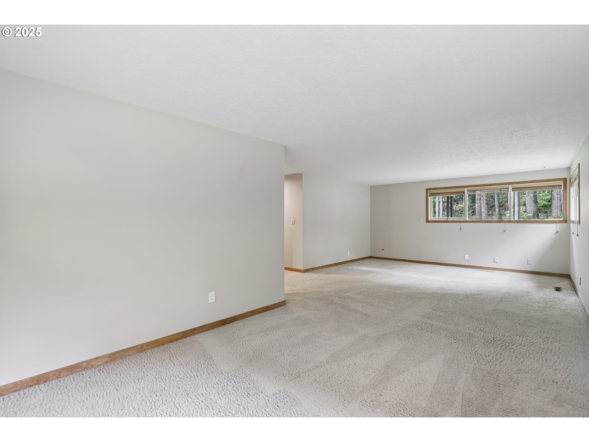 39777 Northwest Murtaugh Road North Plains, OR 97133 - Photo 19 of 45 a view of an empty room with a window