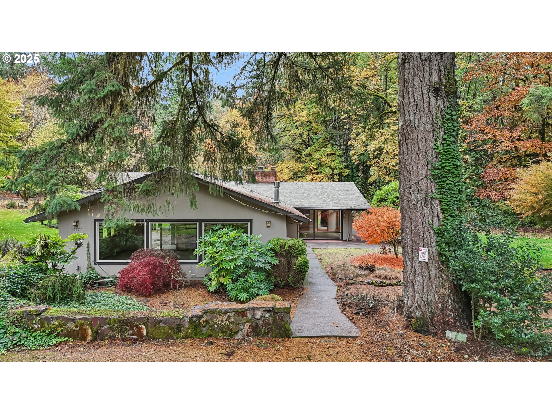 39777 Northwest Murtaugh Road North Plains, OR 97133 - Photo 2 of 45 a view of a house with a backyard