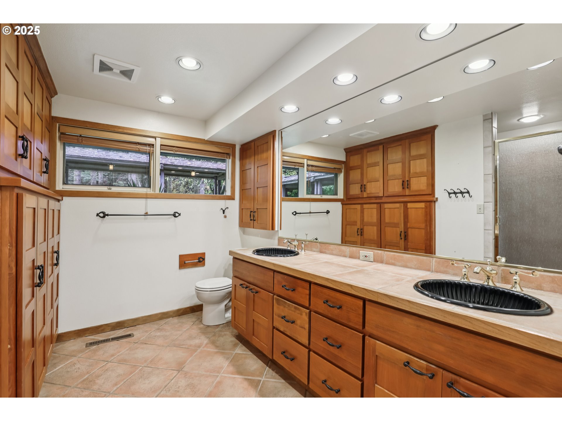 39777 Northwest Murtaugh Road North Plains, OR 97133 - Photo 21 of 45 a bathroom with a sink double vanity and a mirror