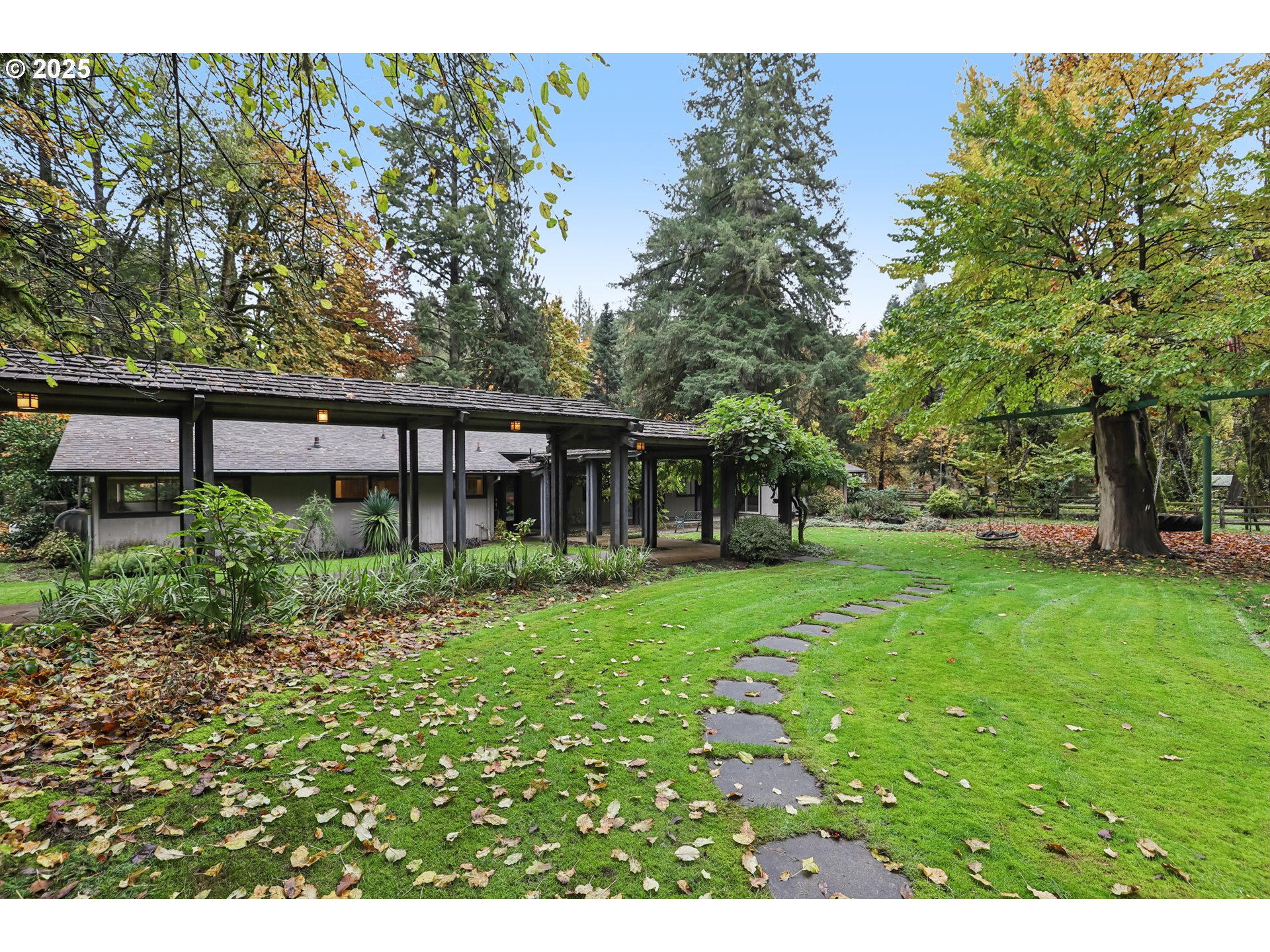 39777 Northwest Murtaugh Road North Plains, OR 97133 - Photo 39 of 45 a view of a house with backyard and sitting area