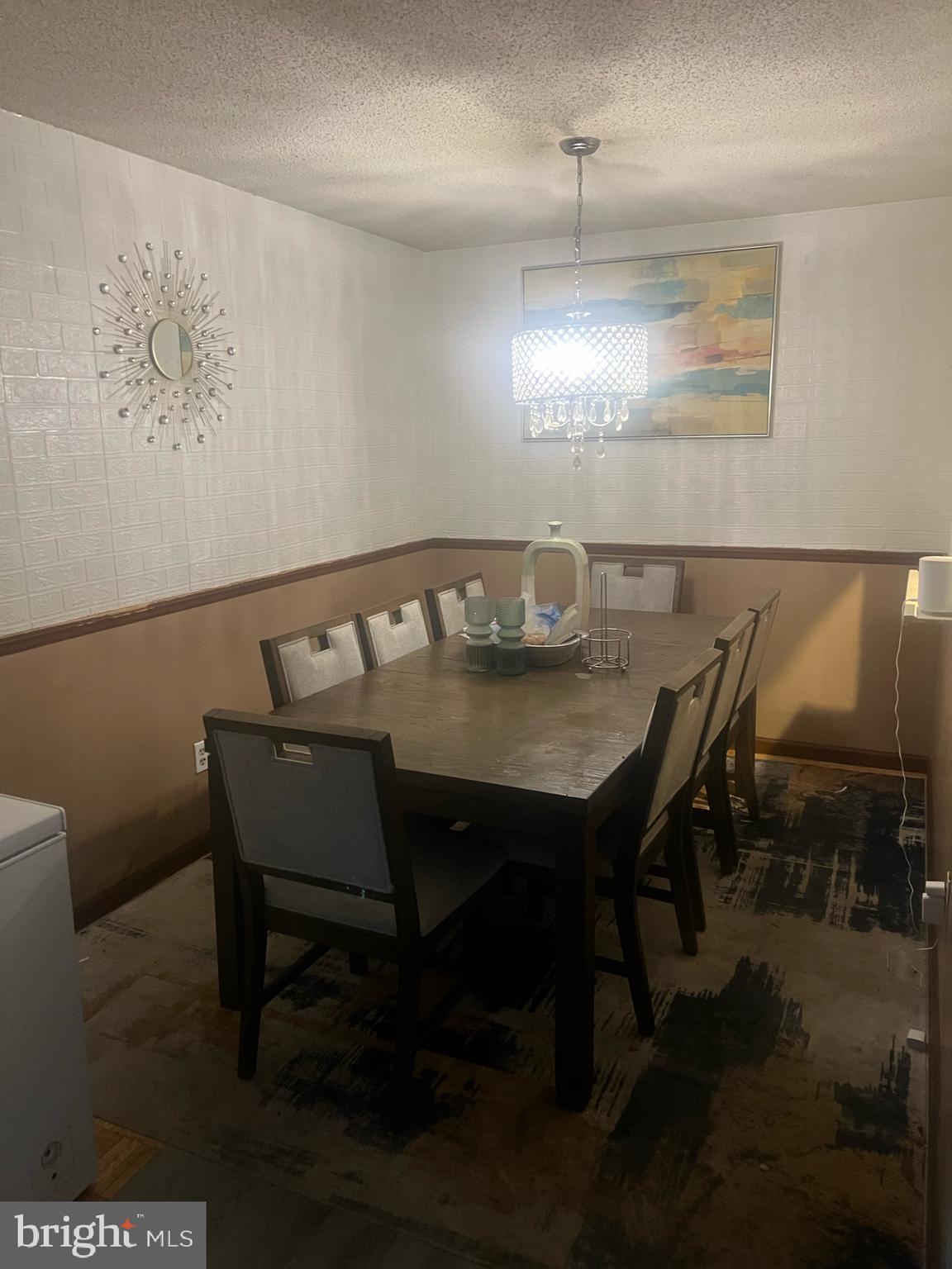 229 Colonial Court Absecon, NJ 08205 - Photo 3 of 7 a view of a dining room with furniture and wooden floor