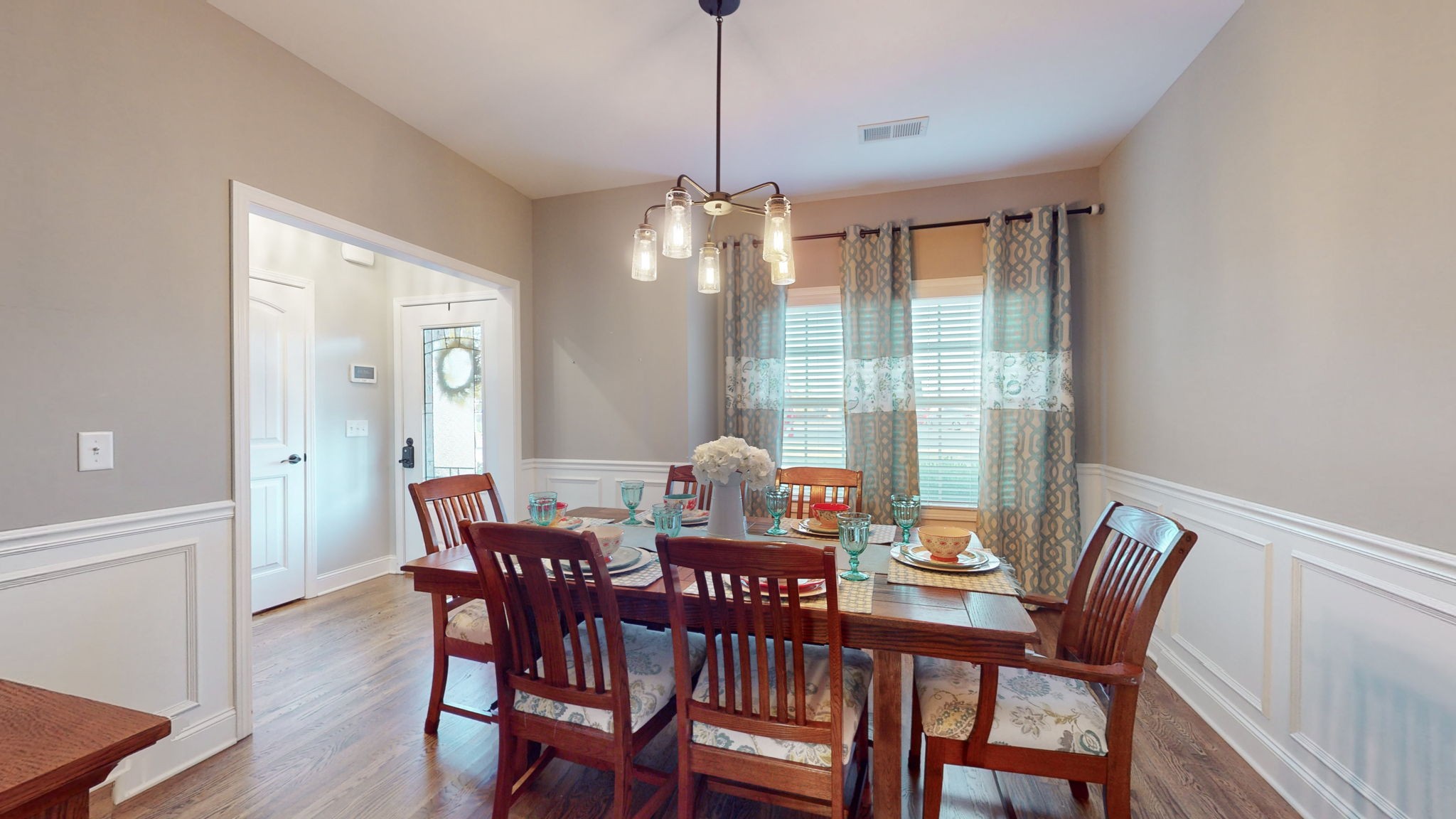 306 Patsy Place Smyrna, TN 37167 - Photo 12 of 34 a view of a dining room with furniture window and wooden floor