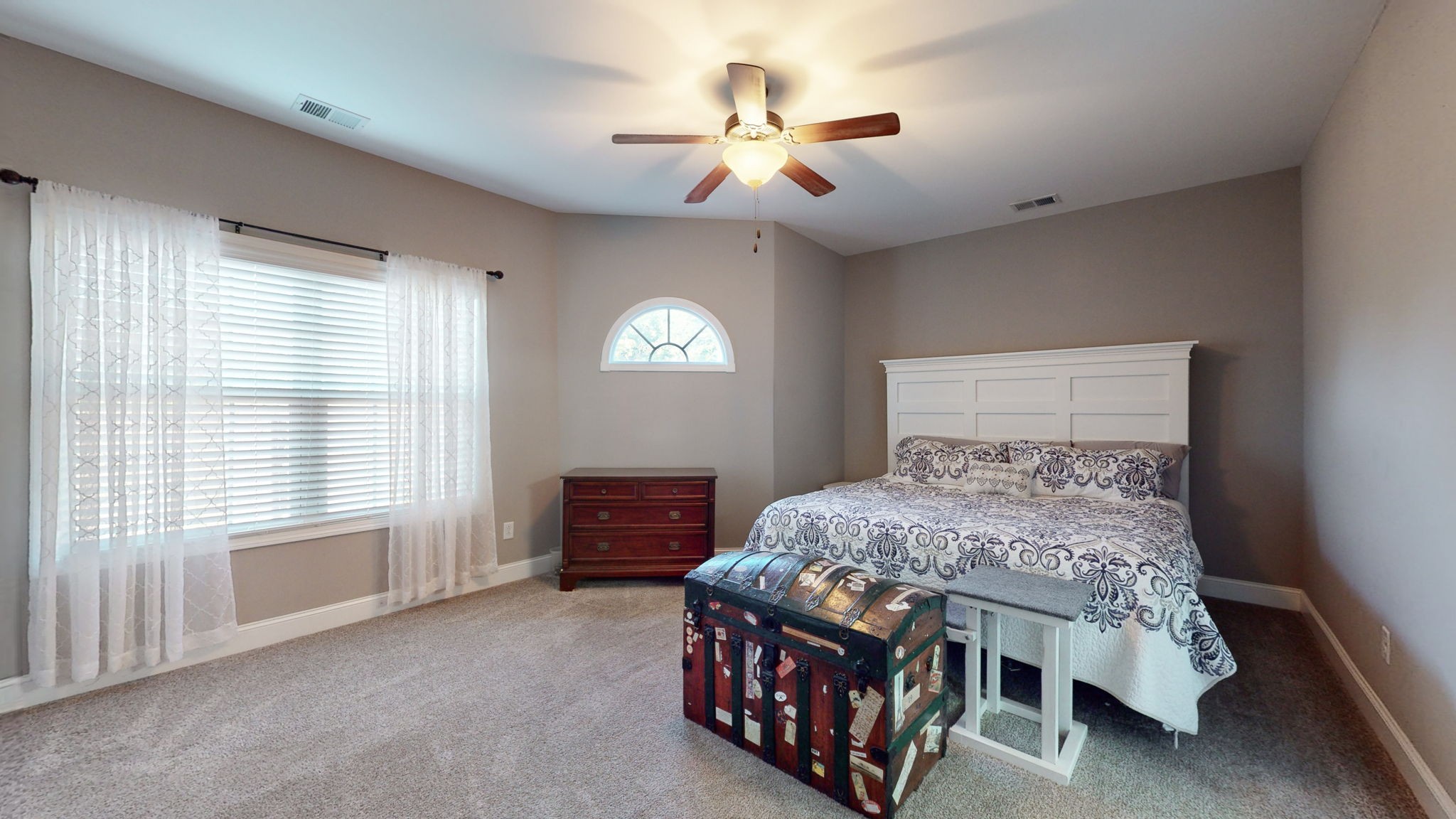 306 Patsy Place Smyrna, TN 37167 - Photo 15 of 34 a bedroom with a bed and a chandelier