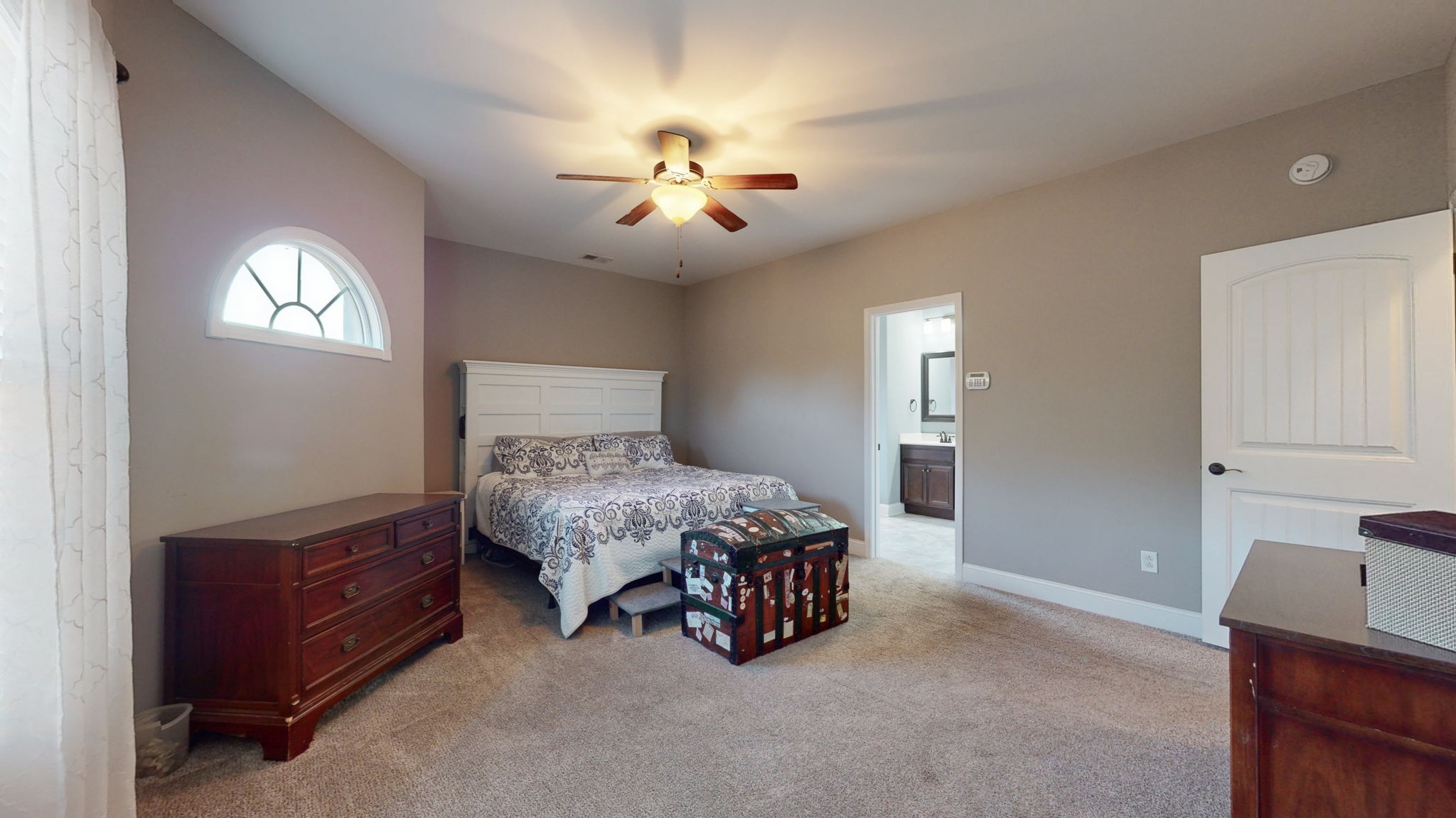 306 Patsy Place Smyrna, TN 37167 - Photo 16 of 34 a bedroom with a bed and a chandelier