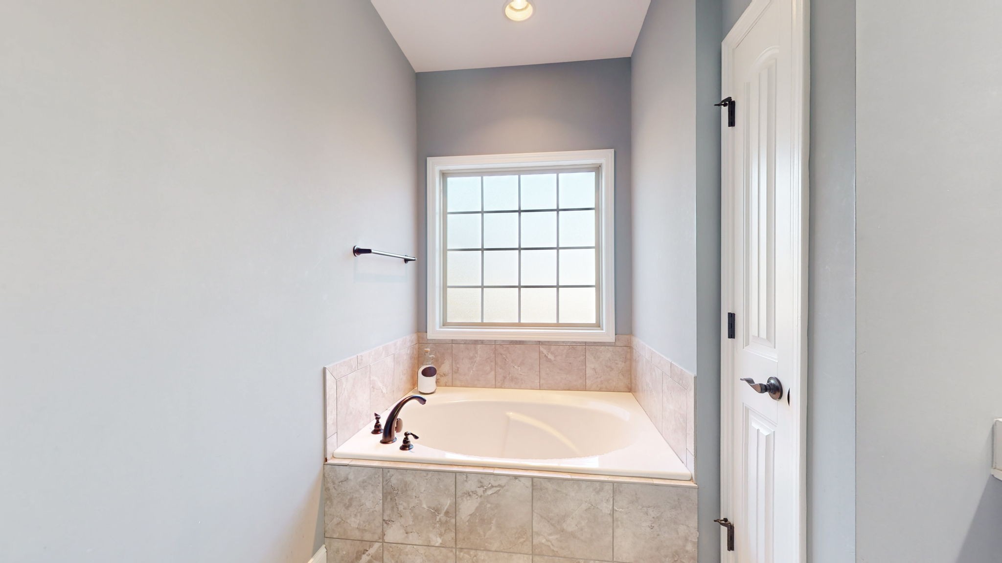 306 Patsy Place Smyrna, TN 37167 - Photo 19 of 34 a bath tub sitting next to a window