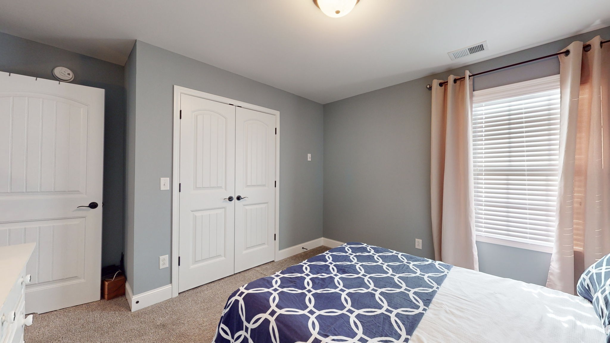 306 Patsy Place Smyrna, TN 37167 - Photo 21 of 34 a bedroom with a bed and a window