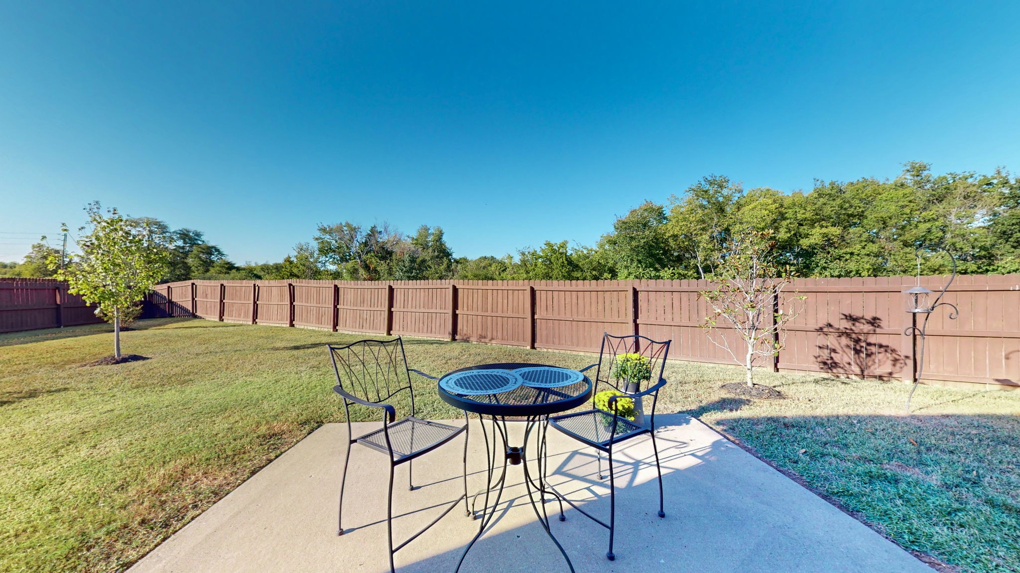 306 Patsy Place Smyrna, TN 37167 - Photo 34 of 34 a backyard of a house with table and chairs