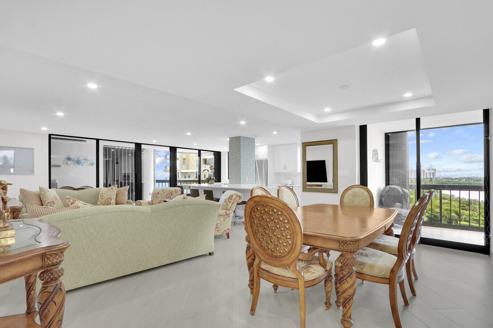 5380 North Ocean Drive, Unit 9A Singer Island, FL 33404 - Photo 2 of 38 a living room with furniture and a large window
