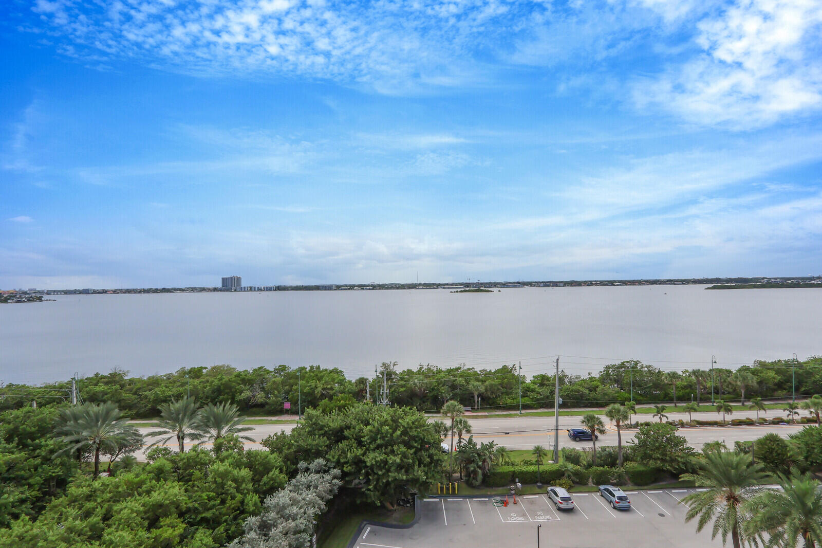 5380 North Ocean Drive, Unit 9A Singer Island, FL 33404 - Photo 34 of 38 a view of a lake with houses in the back