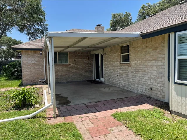 a front view of a house with yard