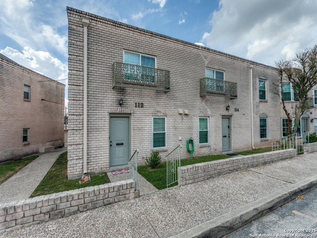 112 Ruelle Lane, Unit 112 San Antonio, TX 78209 - Photo 14 of 16 a front view of a house with garden