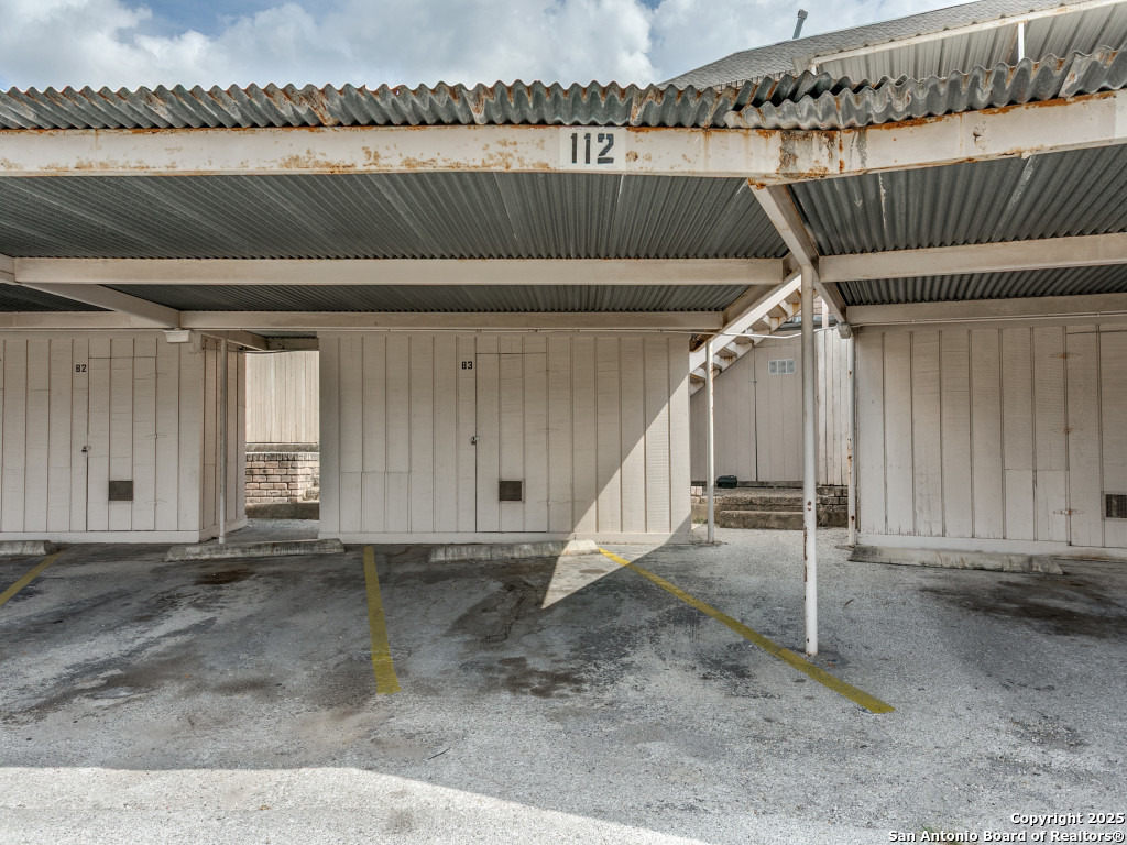 112 Ruelle Lane, Unit 112 San Antonio, TX 78209 - Photo 15 of 16 a view of a room with wooden floor