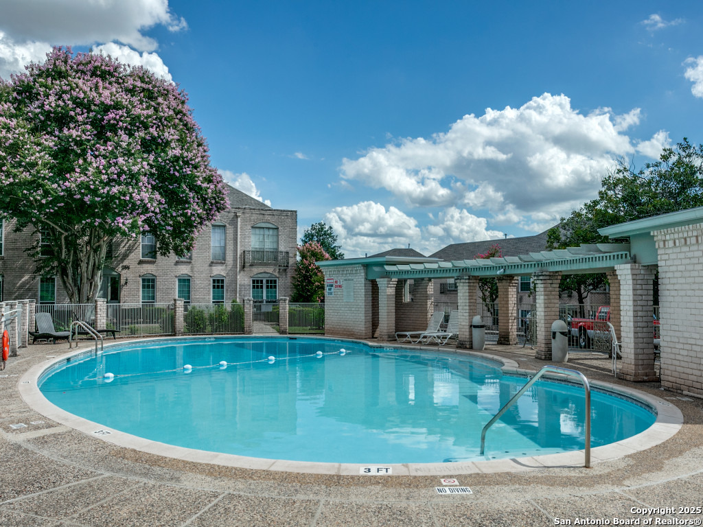 112 Ruelle Lane, Unit 112 San Antonio, TX 78209 - Photo 16 of 16 a view of a house with swimming pool and sitting area