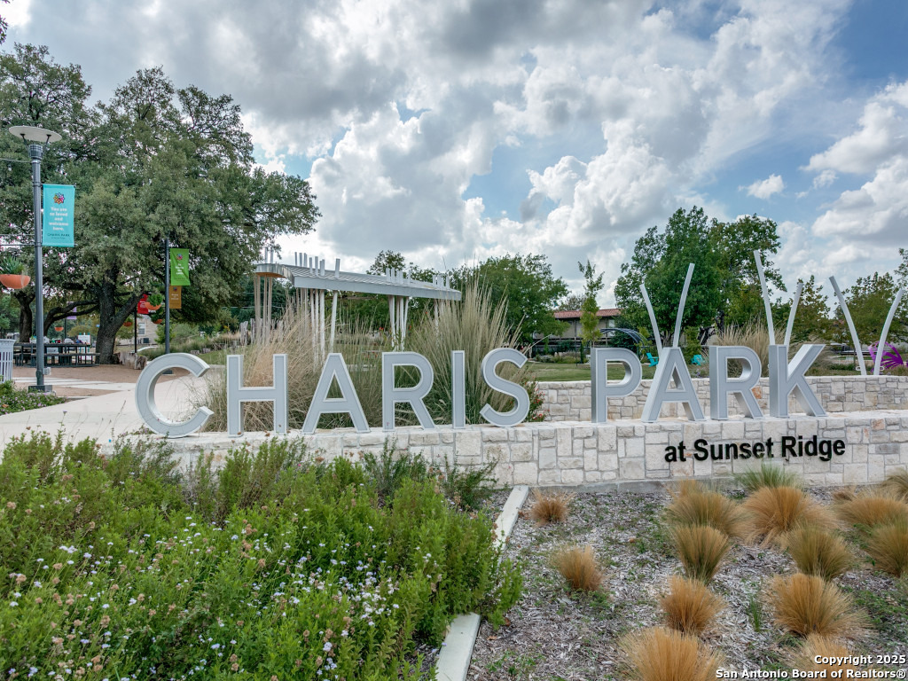 112 Ruelle Lane, Unit 112 San Antonio, TX 78209 - Photo 10 of 16 a house view with a garden space