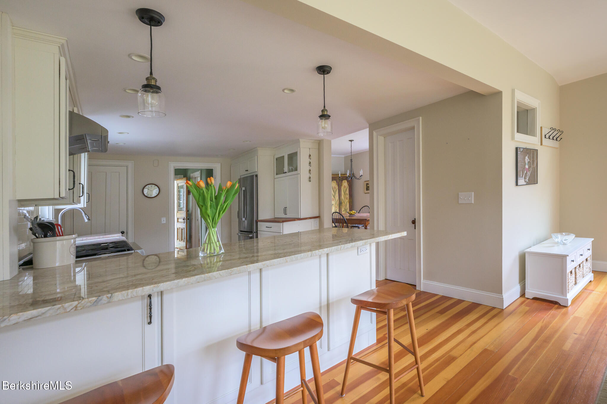 11 Sergeant Street Stockbridge, MA 01262 - Photo 11 of 52 a kitchen with stainless steel appliances granite countertop a sink refrigerator and cabinets