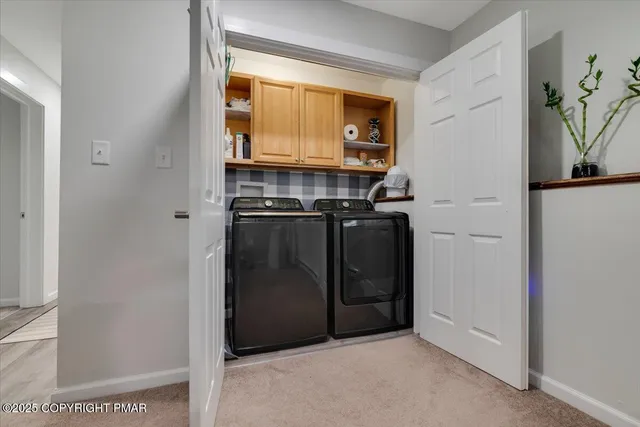 a view of a kitchen with a sink