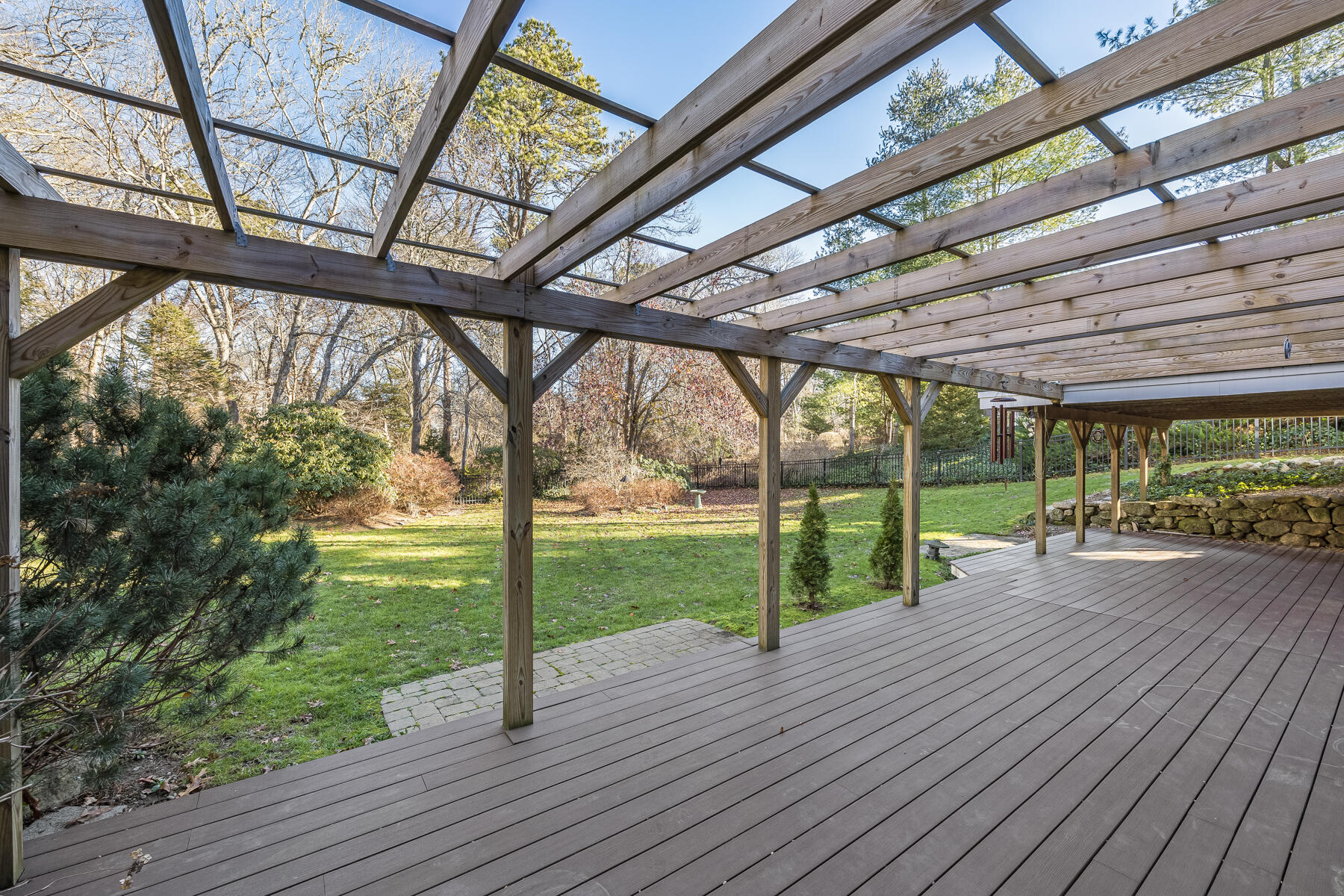 683 Mistic Drive Marstons Mills, MA 02648 - Photo 13 of 50 a view of yard with deck and wooden floor
